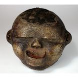 An East African Makonde tribe terracotta mask with real human hair,