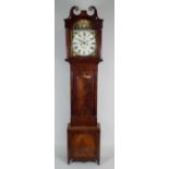 A William IV mahogany eight day longcase clock, the arched painted dial signed 'W Rutherford,