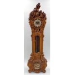 A Continental walnut Louis XV style three train longcase clock,
