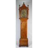 A George III oak eight day longcase clock, the 12 inch arched brass dial signed 'Knight,