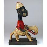 A West African Nigerian Yoruba painted equestrian figure on display plinth (some splits to side of