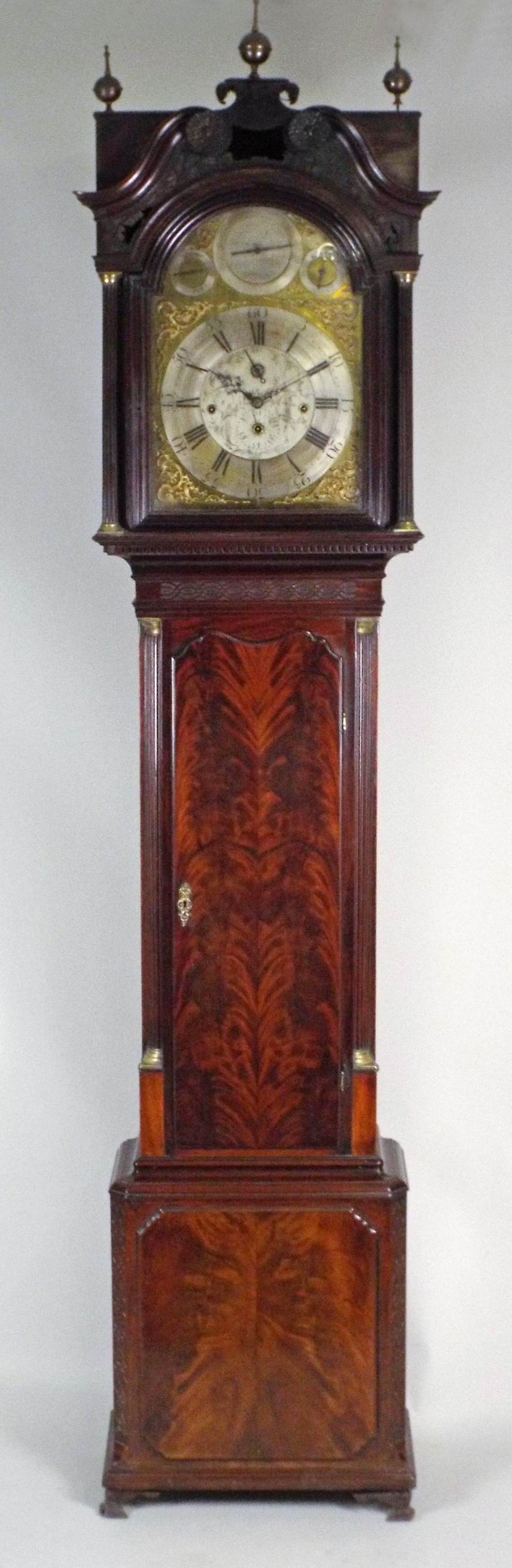 A George III mahogany musical longcase clock, the 14 inch arched brass dial signed 'Jos Slater,