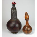 Two Ethiopian Borana Tribe Storage calabashes, one with circular fibre stand,