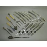 A collection of silver handled fruit knives and forks together with a silver mounted button hook