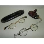 Three pairs of spectacles, two within original cases.