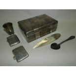 A silver mounted cigarette box together with two silver vesta cases,