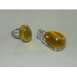 A Burmese amber dress ring together with a Burmese amber pendant.