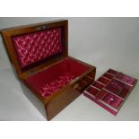 A late Victorian walnut crossbanded jewellery box with dark pink satin and velour lining and