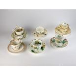 A collection of cups and saucers, early-mid 19th century English,