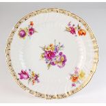 A KPM Berlin 'Neuozier' porcelain dinner plate,