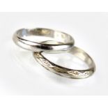 Two white metal wedding bands, stamped 'plat' and 'platinum', total weight 6.
