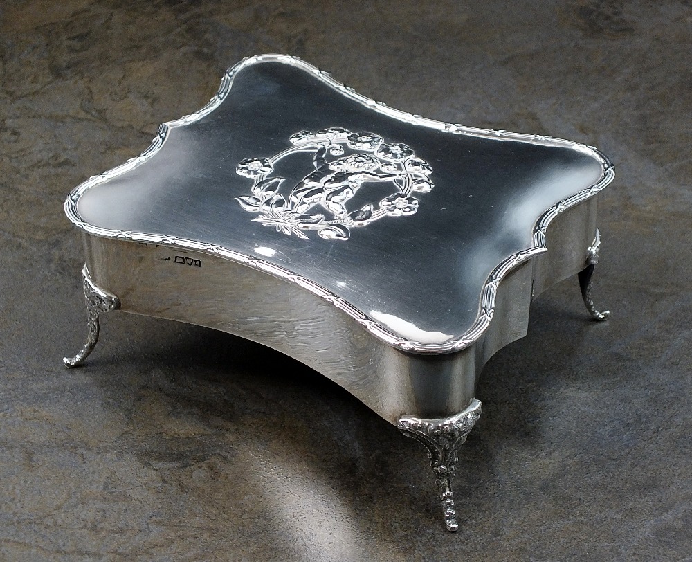 An Edwardian silver mounted dressing table box, makers mark rubbed, Chester 1903,