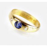 A Victorian 22ct gold three stone sapphire and diamond ring,