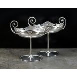 A pair of Arts and Crafts Murrle Bennett silver pedestal bon bon dishes,