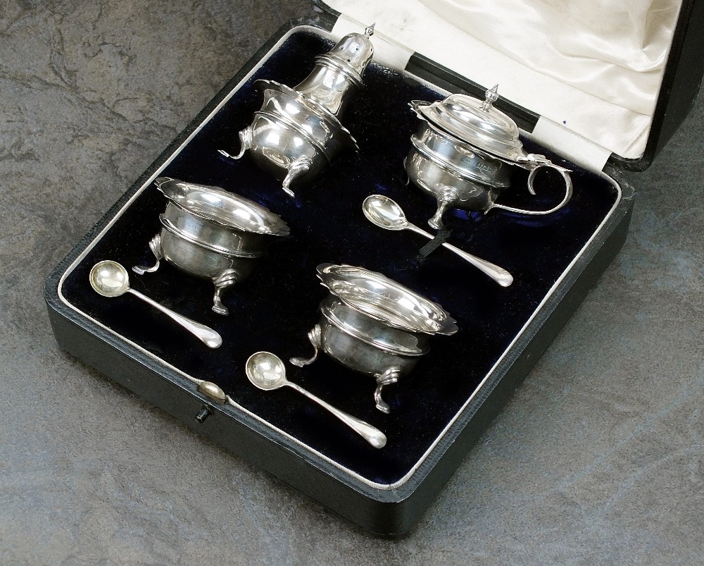 A cased four piece silver condiment set, John Rose, Birmingham 1913,