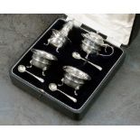 A cased four piece silver condiment set, John Rose, Birmingham 1913,