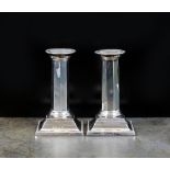 A pair of Edwardian short silver candlesticks, A & J Zimmerman Ltd, Birmingham 1903,