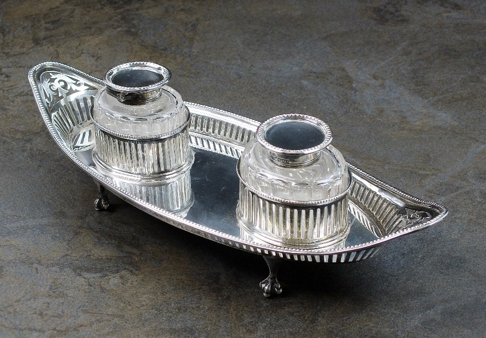 An Edwardian Goldsmiths & Silversmiths silver ink stand, London 1902,