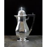 A George II style silver hot water jug, Mappin & Webb, Sheffield, date mark rubbed,