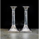 A pair of Edwardian silver candlesticks, Thomas Bradbury & Sons Ltd, London 1904,