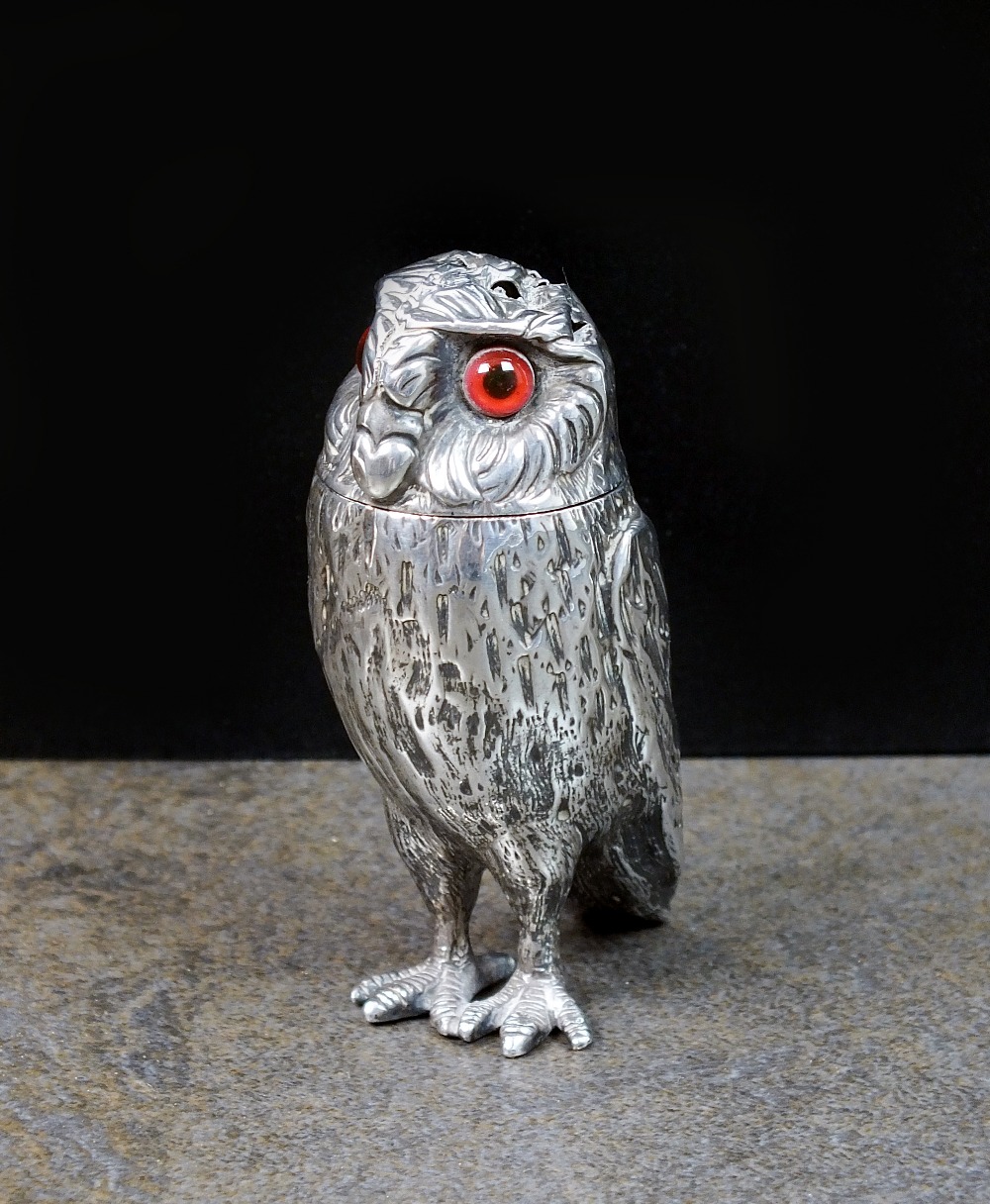 A Victorian novelty silver pepperette in the form of an owl, Richards & Brown, London 1874,