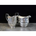 A George III silver cream jug, Duncan Urquhart & Naphtali Hart, London 1803,