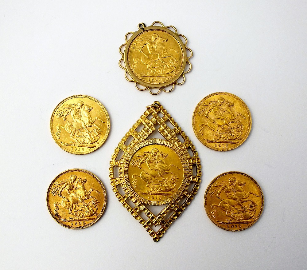 Six assorted sovereigns, two within pendant mounts, comprising; Victoria Jubilee head, dated 1892,