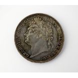 A George IV crown, dated 1821, Secundo edge, ref S.