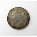 A Queen Anne crown, dated 1713, third bust, roses and plumes, Duodecimo edge, ref S.