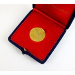 A Battle of Britain 25 year commemorative medal,  18ct gold, by metal import Ltd, 1965,