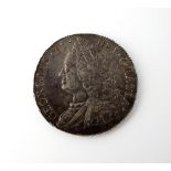 A George II crown, dated 1750, old bust, plain reverse, Quarto edge, ref S.