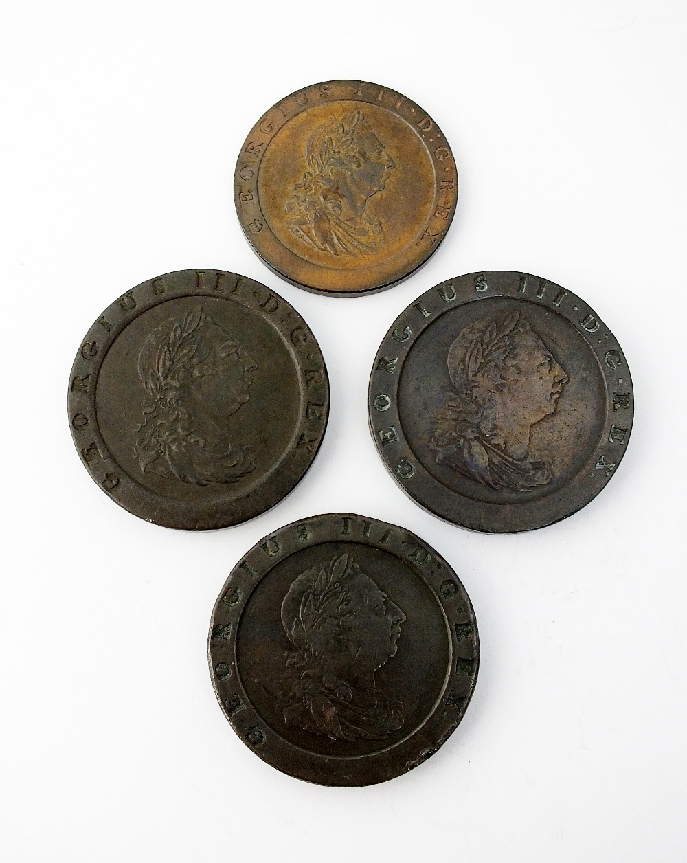 Three George III Cartwheel twopence, dated 1797, together with a Cartwheel penny,