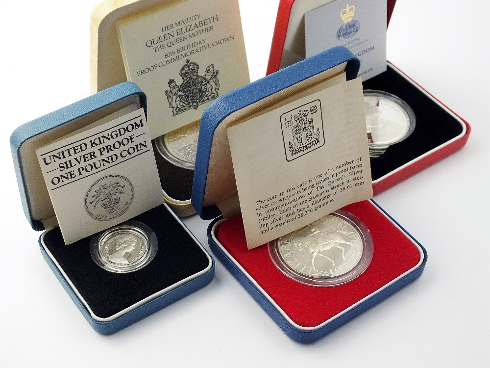 Fourteen Elizabeth II silver proof coins, comprising; four £5, four crowns, £2, three £1,