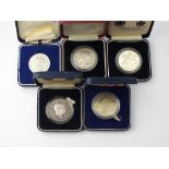 Four cased silver Edward VIII crowns, dated 1936 x 2, 1937 and Bermuda 1936, all by Spink & Son,