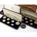 A George V specimen eight coin set, half crown to farthing, within fitted case,