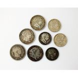 Four George III shillings, dated 1817 x 2, 1819 and 1820, together with four sixpences, dated 1816,