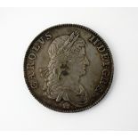 A Charles II crown, dated 1662, first bust, rose below bust, undated edge, ref S.