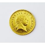 A George III gold third guinea, dated 1810, ref S.