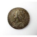A George II crown, dated 1735, young bust, roses and plumes, Octavo edge, ref S.