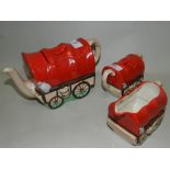 A mid 20th century Sadler Pottery novelty three piece tea service in the form of a wagon,