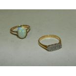 A single opal dress ring,