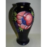 A large contemporary Moorcroft baluster vase,