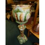 A continental majolica style jardiniere and stand,