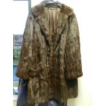 A three quarter length mink coat bearing the label 'Lafayette Furs,