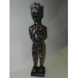 A West African Baule tribe painted female figure, mounted,