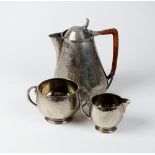 A Tudric pewter sugar bowl and cream jug, No.