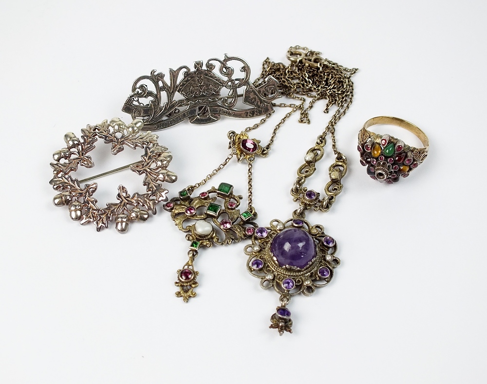 A blister pearl, garnet, emerald and paste set pendant, together with an amethyst pendant,