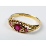 An 18ct gold ruby and diamond dress ring,