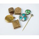 A 9ct gold rectangular locket, together with three further lockets,