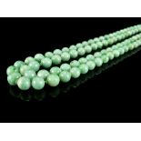 A double strand jade bead necklace,